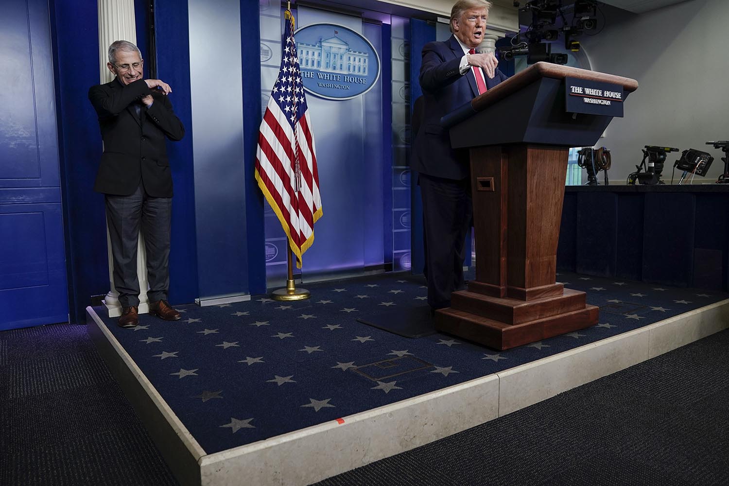 Poll: Majority approve of Trump's coronavirus response, but more Americans say he was too slow to act 1