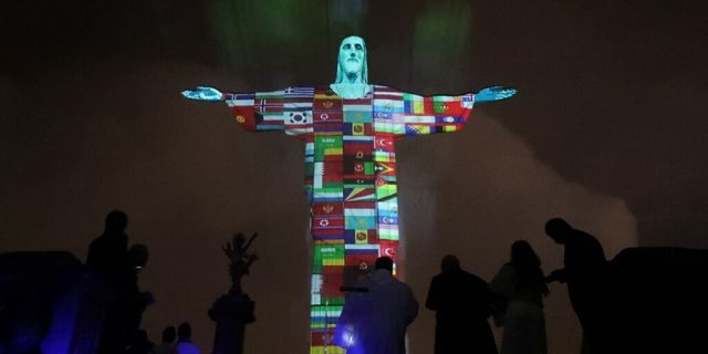 Christ the Redeemer lit up with every country affected by coronavirus: 'Pray together' 1