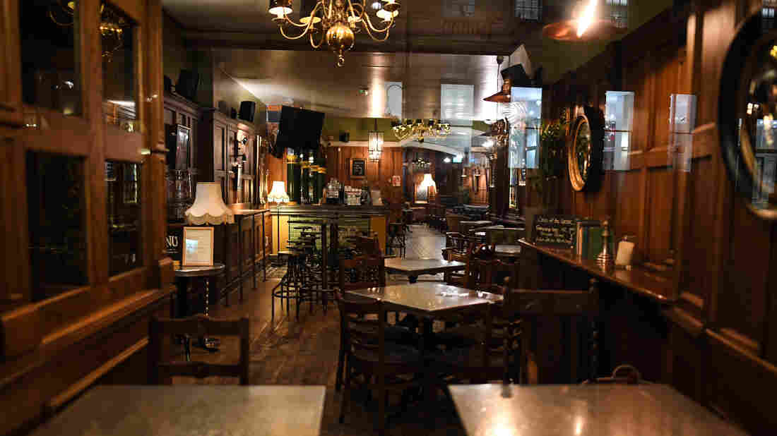 U.K. Shuts Pubs, Restaurants And Other Locales To Curb Coronavirus Spread 1