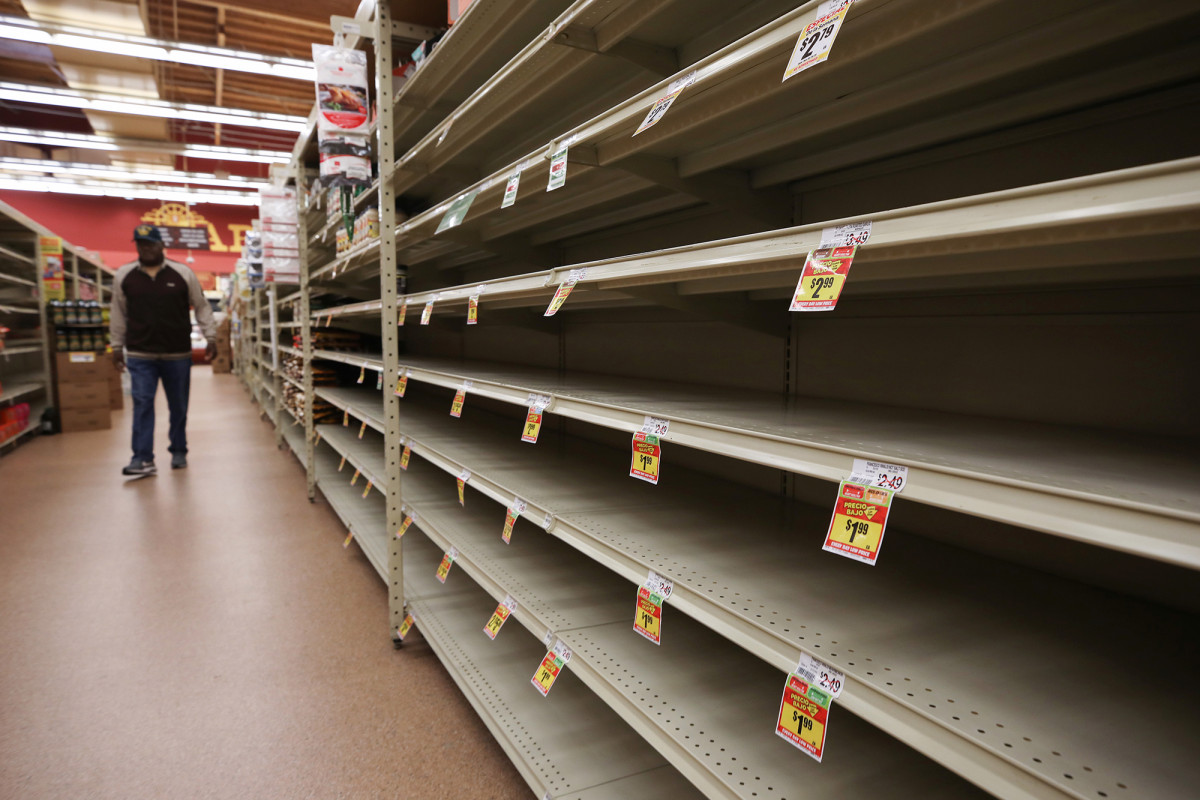 Elderly woman ‘in tears’ over empty shelves amid coronavirus panic-buying 1