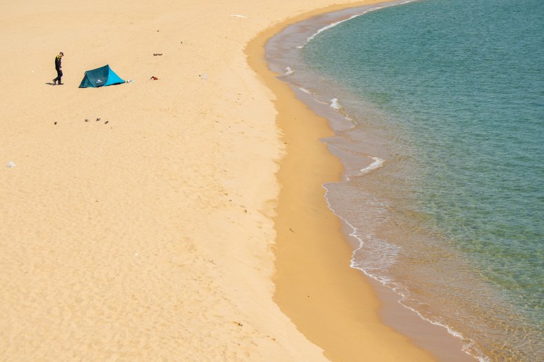 Man 'Proposes' to Girlfriend on Beach During Spain's Coronavirus Lockdown, Gets Fined 1