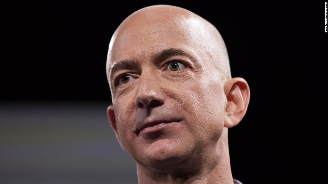 Bezos tells shareholders to 'take a seat' as Amazon manages
Covid-19 1