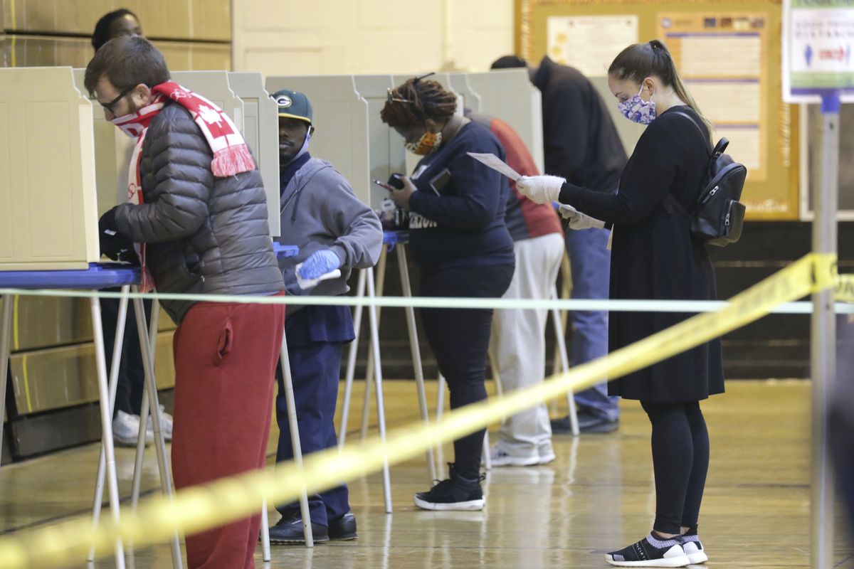 52 people who took part in Wisconsin election tested
positive for coronavirus 1