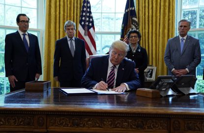 Trump signs $484 billion aid bill for hospitals and
businesses, as Congress looks ahead to next coronavirus
stimulus 1