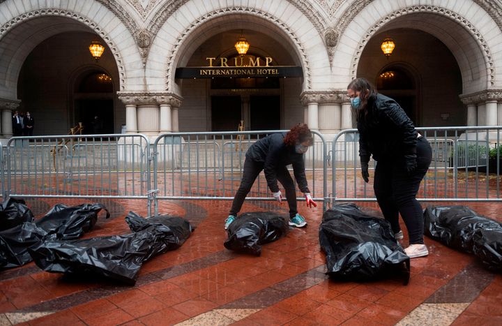 COVID-19 Protesters Leave Body Bags At Foot Of Trump’s D.C.
Hotel 1