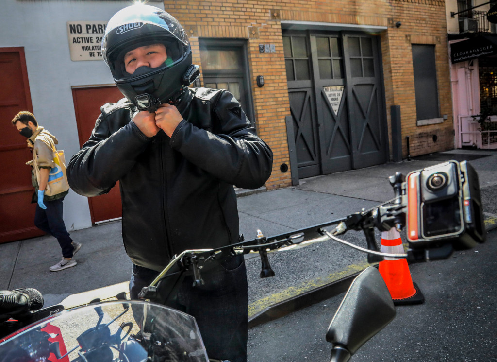 From guns to GoPros, Asian Americans seek to deter attacks
amid coronavirus pandemic 1