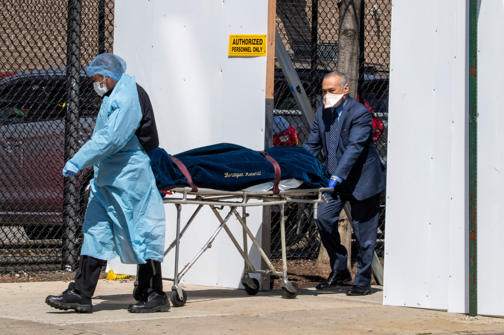 Photos: Deaths mount as hard-hit New York City struggles to triage coronavirus patients 1