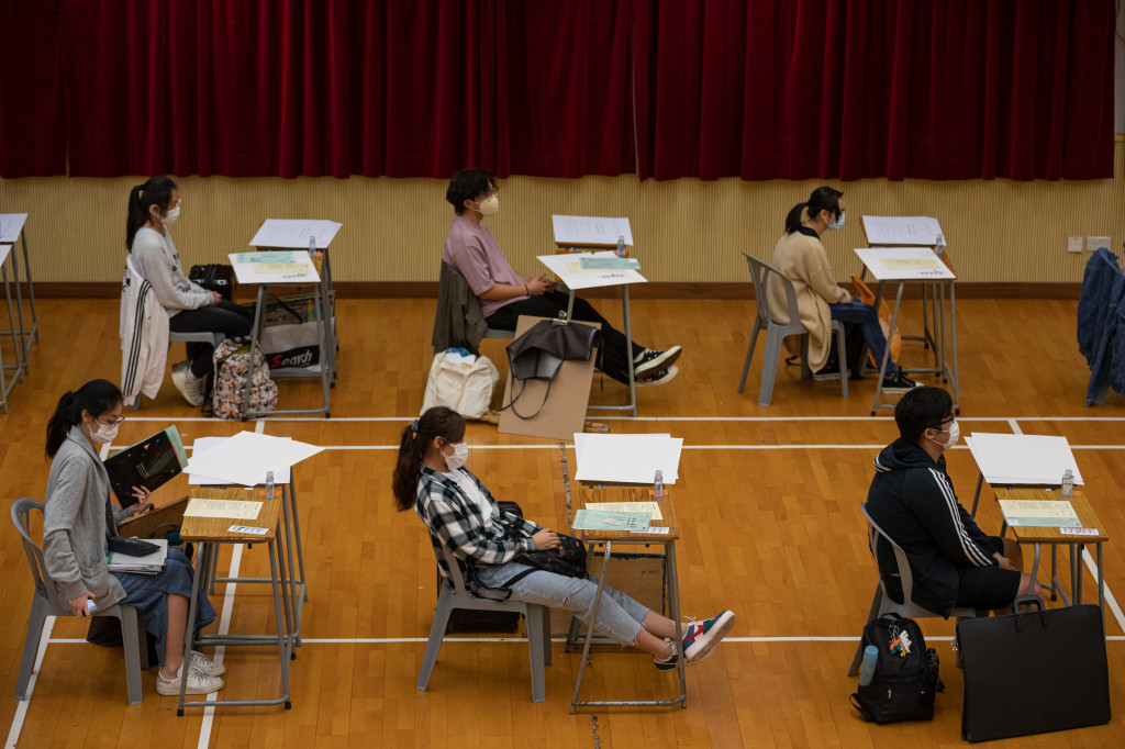 Masked Hong Kong students take final school exams after
coronavirus delay 1
