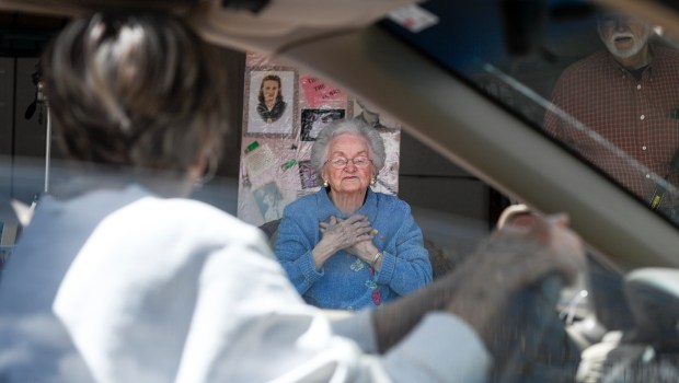 PHOTOS: Coronavirus shutdown doesn’t stop 100th birthday
party for Evelyn Berkey 1