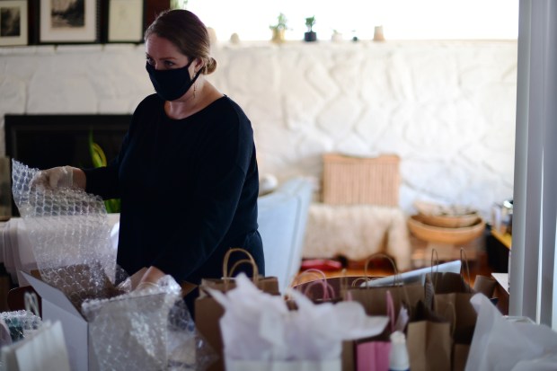 Coronavirus has Denver retailers keeping inventory in their
living rooms, providing toys for school lunches 1