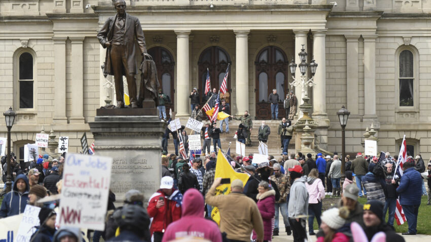 Chanting 'lock her up,' Michigan protesters in MAGA hats
mass against Gretchen Whitmer's coronavirus restrictions 1
