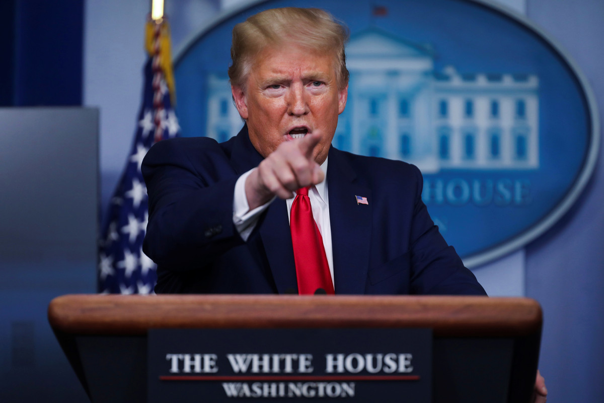 Trump blasts criticism of coronavirus testing as partisan
attack 1