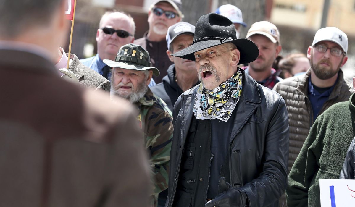 Wyoming governor engages with COVID-19 protesters at
Capitol 1