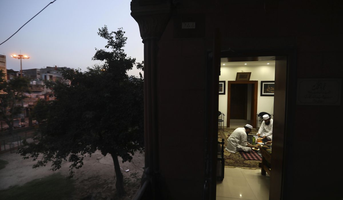 AP PHOTOS: Images of Ramadan during the coronavirus
pandemic 1