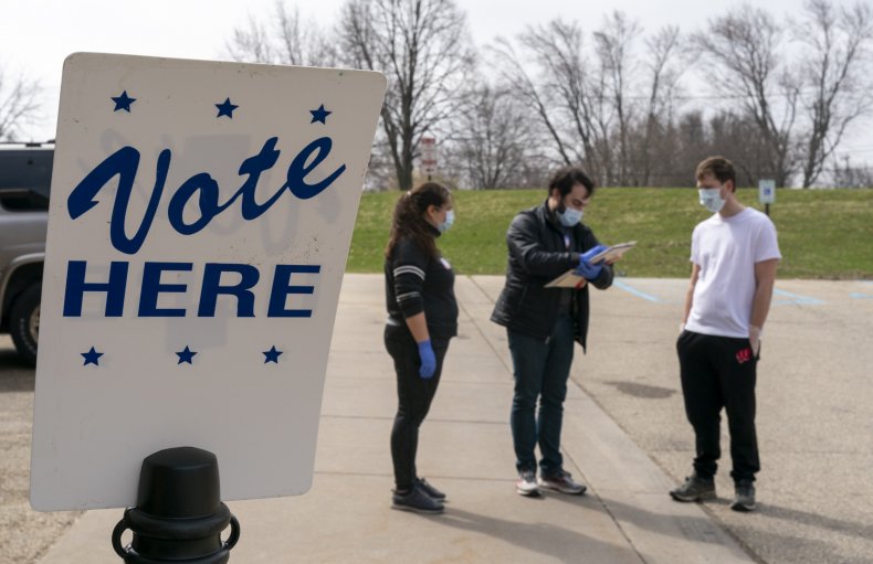 Dozens of Wisconsin Voters, Poll Workers Test Positive for
Coronavirus After Primary Election 1