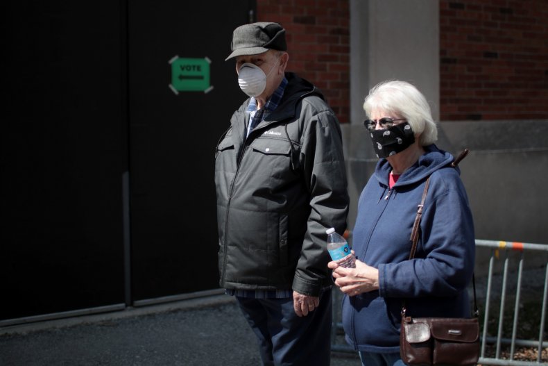 Backlash After Wisconsin Voters Forced to Line up for Hours in Rain and Risk Catching Coronavirus to Vote in Primary 1