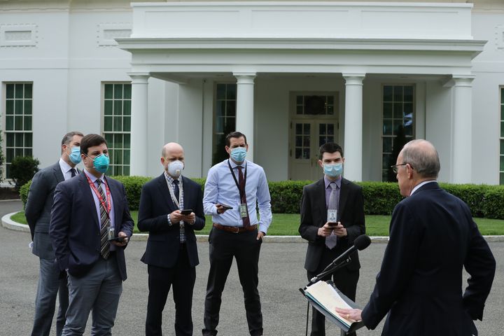 While Trump Urges States To Reopen, White House Adopts New
COVID-19 Precautions 1