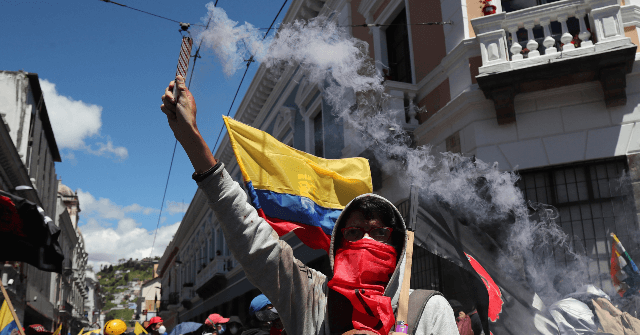 Thousands Take Streets in Ecuador Against Coronavirus Budget
Cuts 1