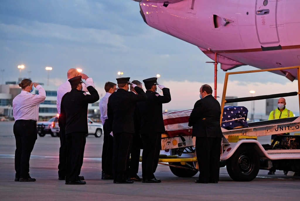 PHOTOS: Procession honors paramedic Paul Cary, who died from
coronavirus after volunteering in NYC 1