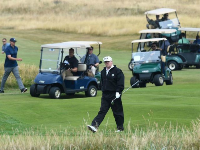 Donald Trump Returns to Golf Course During Coronavirus
Outbreak 1