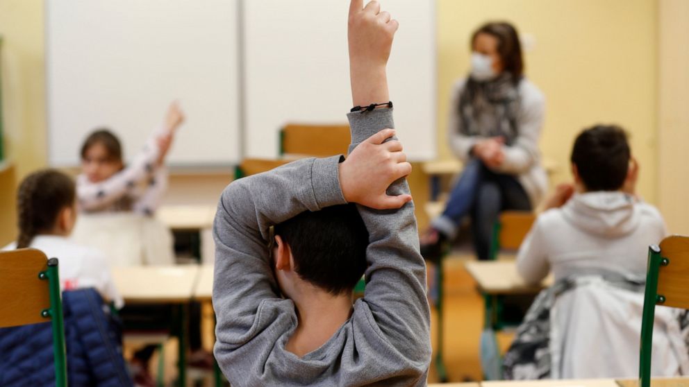 70 cases of COVID-19 at French schools days after
re-opening 1