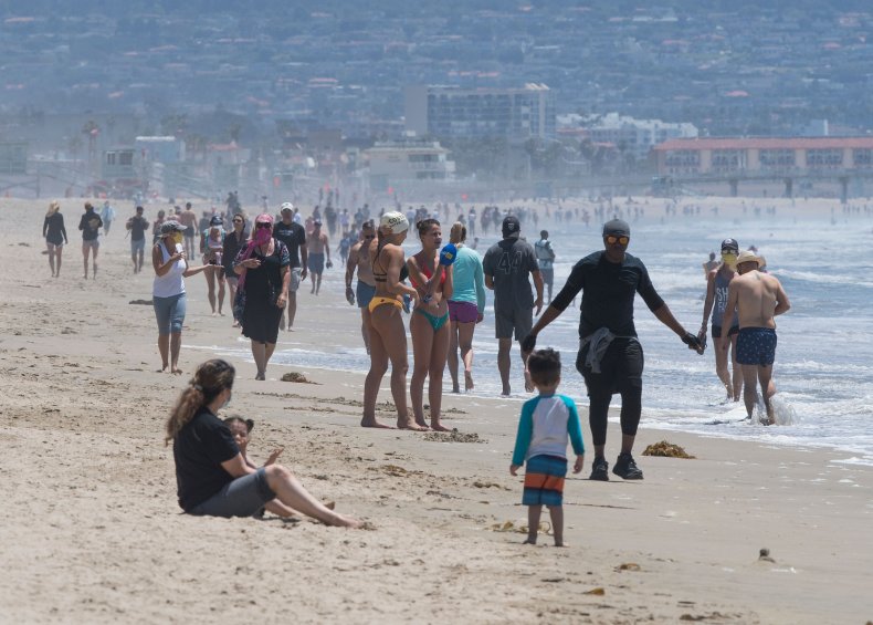 Los Angeles County Coronavirus Death Toll Hits Nearly 2,000
As Some Beaches, Recreational Facilities and Retailers
Reopen 1
