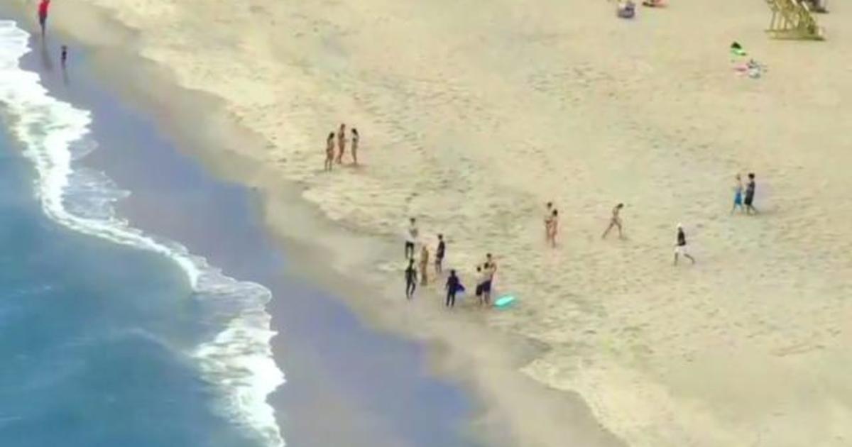 As warmer weather begins, American beaches prepare for surge
amid COVID-19 1