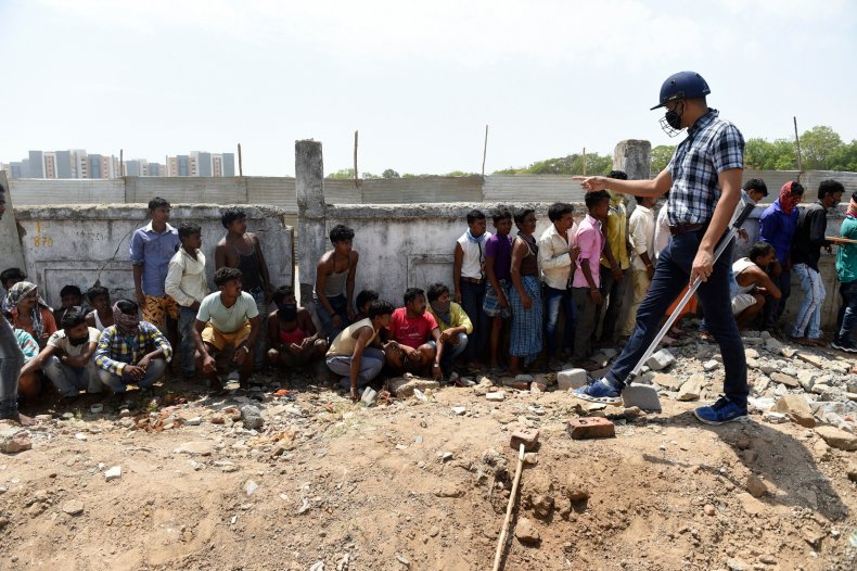 India Records Largest Single-Day Surge in Coronavirus Cases
After International Migrant Workers Return Home Due to Lost
Jobs 1