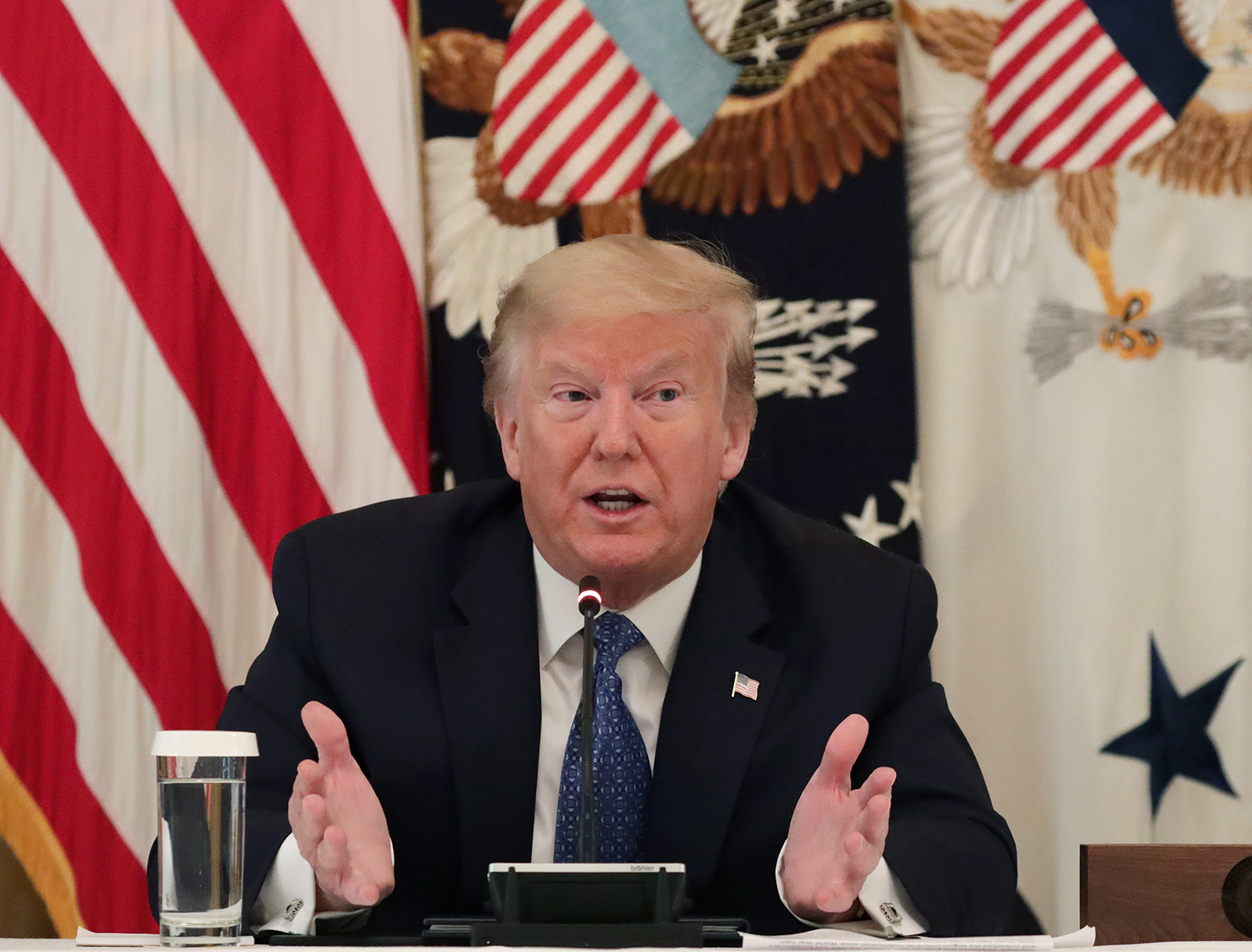 Trump says he is considering a travel ban on Latin America
and praises the high number of US Covid-19 cases, saying it means
the US is testing more people 1