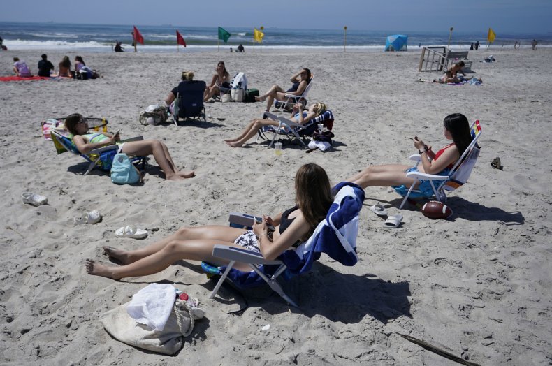 As Coronavirus Death Toll Nears 98,000, Americans Pack
Beaches, Parks, and Pools on Memorial Day 1