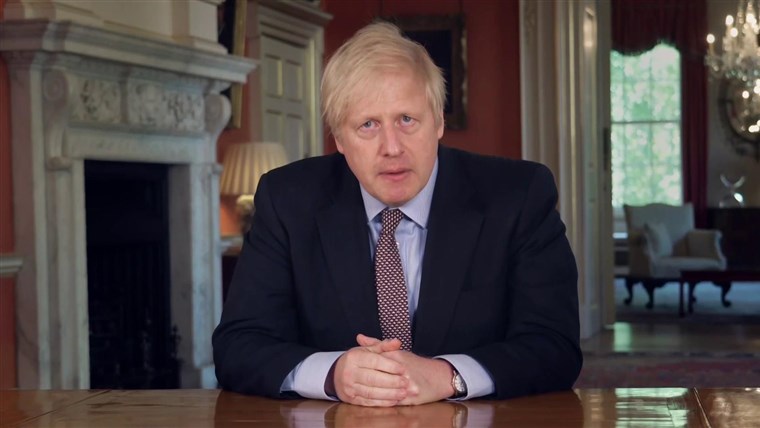 Boris Johnson puts coronavirus strategy on the line to
defend embattled adviser 1