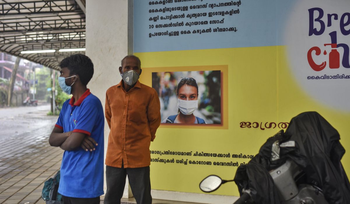 The Latest: India sees record jump of COVID-19 cases 1