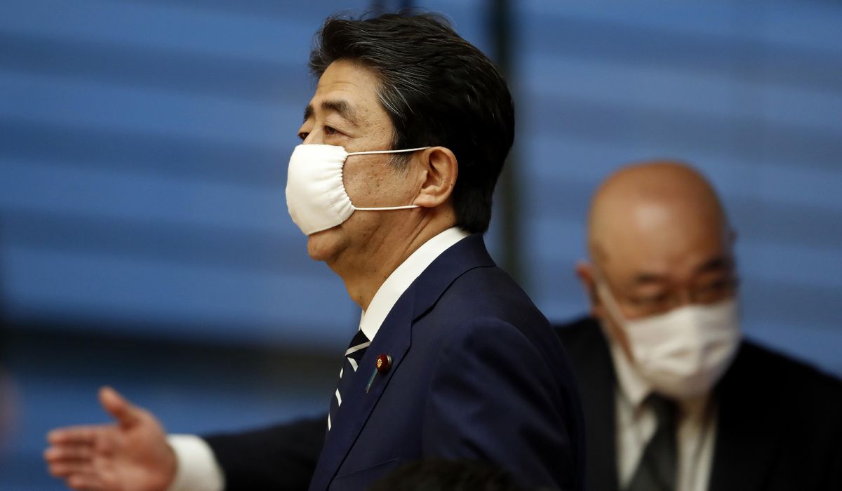 Japan lifts coronavirus emergency in all remaining
areas 1