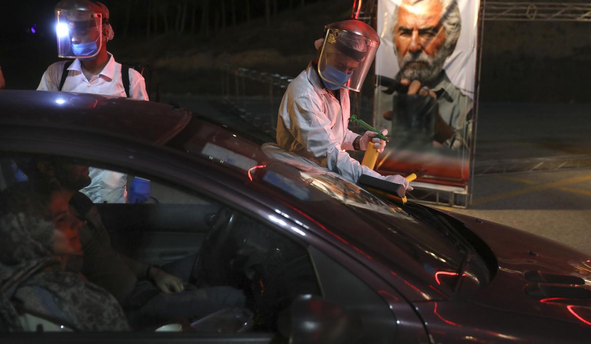 Coronavirus returns long-banned drive-in movies to
Iran 1