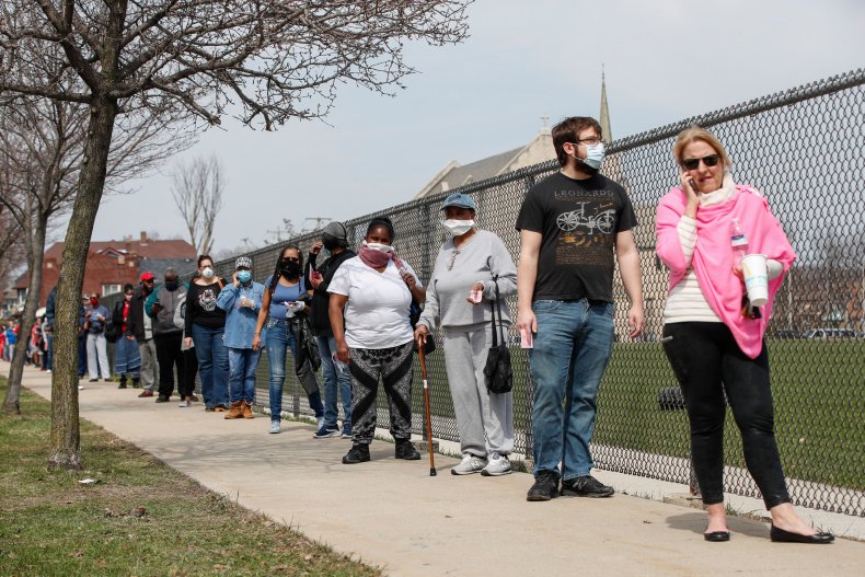Wisconsin's In-Person Voting May Have Led to 'Large'
Increase in Coronavirus Cases, Study Suggests 1