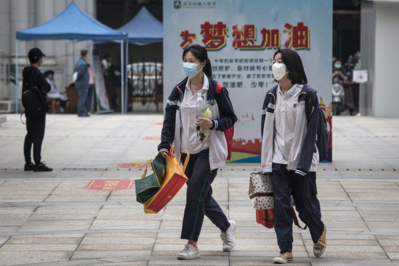 Wuhan Reports First Coronavirus Case in a Month as Fresh
Outbreaks Test Model Pandemic Plans in South Korea and
Germany 1