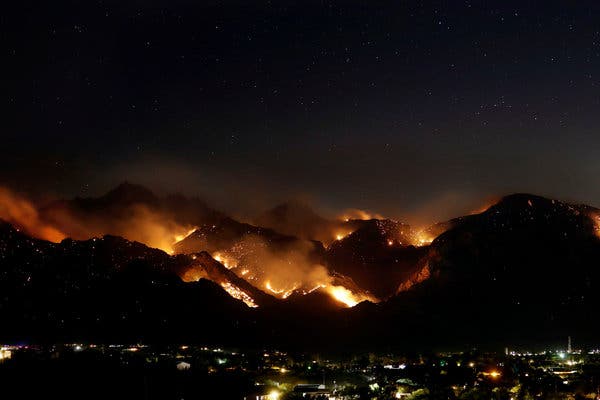 Arizona Wildfires Force Hundreds to Evacuate as Coronavirus
Cases Surge 1
