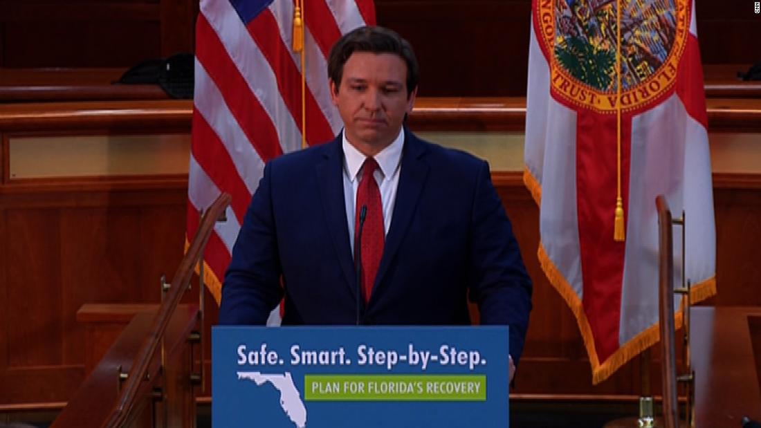 Pressure mounts on DeSantis as Covid-19 cases spike in
Florida 1