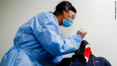 New York state says it's 'tamed the beast' of coronavirus
while some states see record hospitalizations 1