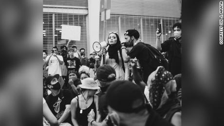 A Muslim woman says her headscarf was forcibly removed from
her head for a booking photo after being arrested at a Black Lives
Matter protest 1