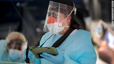 California reports more than 7,000 new coronavirus cases in
a day, breaking its daily record again 1