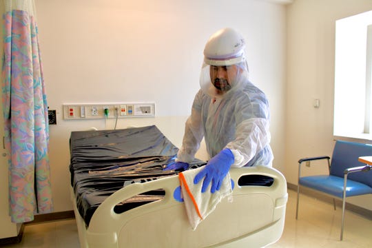 'We're heroes, too:' Hospital janitors risk lives to stop
spread of COVID-19 1