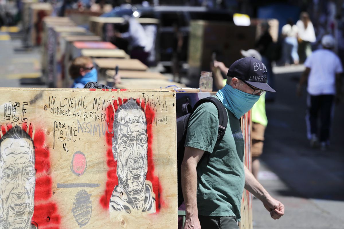 Shooting in Seattle’s police-free protest zone leaves one
dead, another injured 1 Shooting in Seattle’s police-free protest zone leaves one
dead, another injured 1