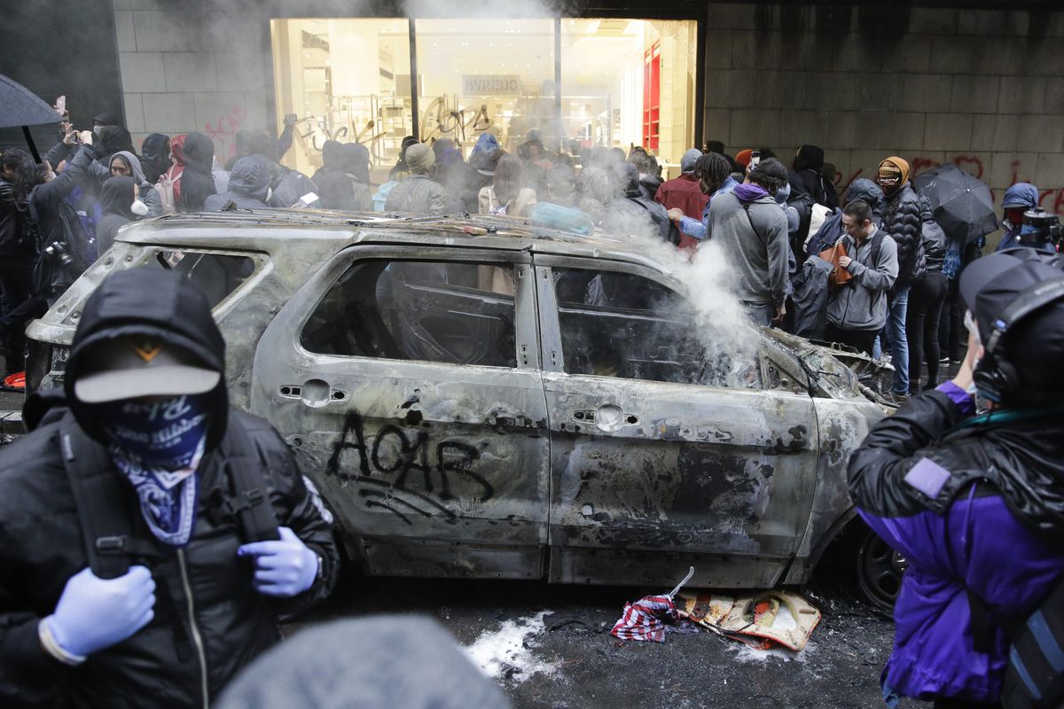 Washington woman arrested for allegedly burning 5 Seattle
cop cars at protest 1