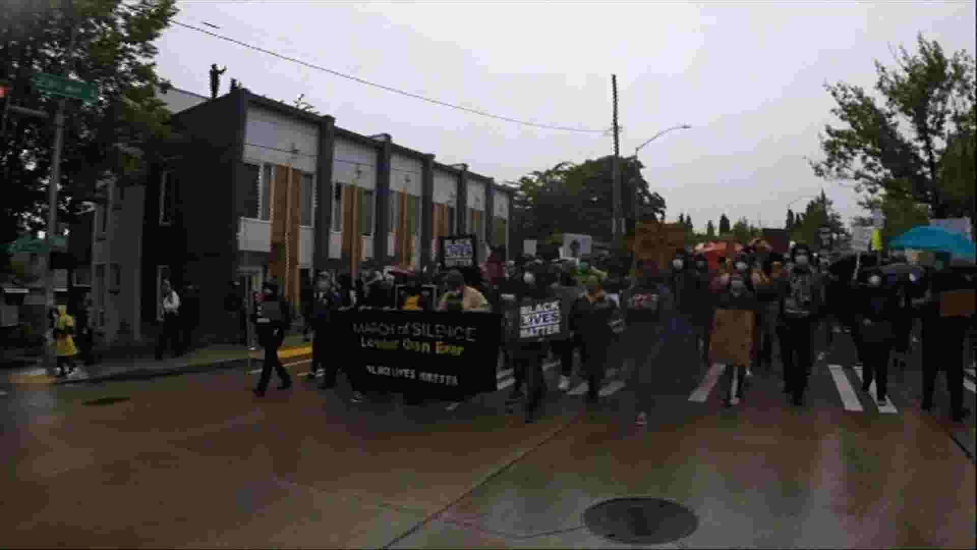 Protesters march silently through Seattle streets 1