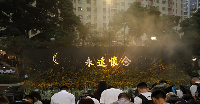 Thousands Flood Hong Kong on Anniversary of Protester
Death 1