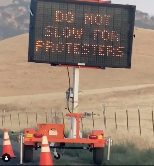 East Bay mobile construction sign says ‘Do not slow for
protesters’ 1