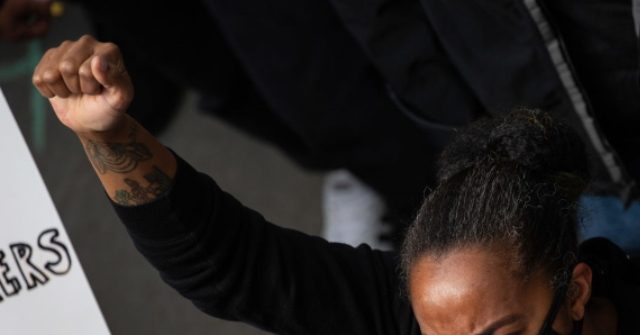 WATCH: Seattle City Council Member Helps Protesters Take
over City Hall 1
