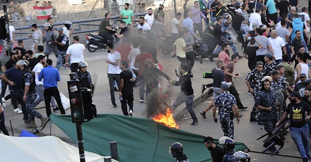 Lebanese Pound Plummets to Record Low as Anti-Government
Protests Erupt 1