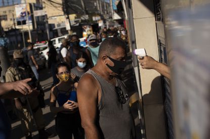 Brazil could surpass U.S. coronavirus death toll in a month
amid dramatic surge of new infections 1 Brazil could surpass U.S. coronavirus death toll in a month
amid dramatic surge of new infections 1